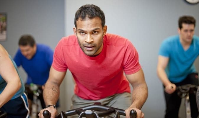 Person in a static bicycle